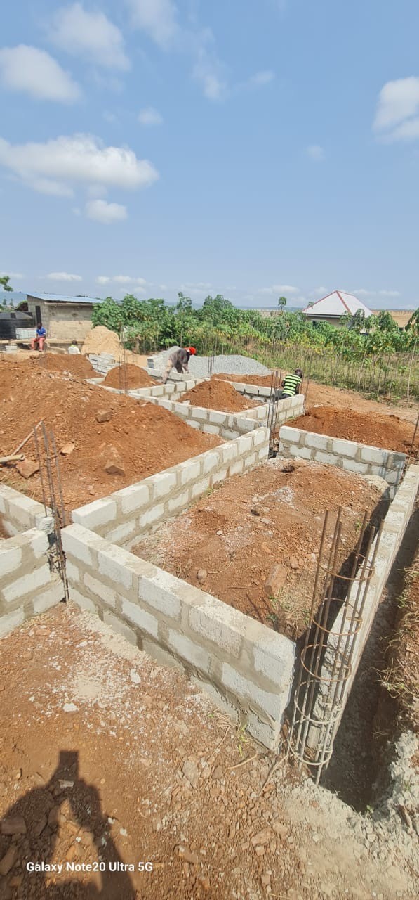 Blockwork and reinforced foundation walls under construction